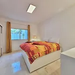 Another Day In Paradise Apartment